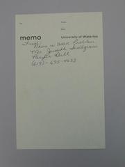 Memo sheet with phone numbers for Pacific Bell and for BASIC problems